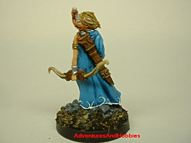 Female Elf warrior with longbow painted fantasy figure for use in role-playing games and table top war games rear view