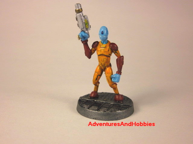 Alien warrior with handgun painted 25 mm figure for science fiction role-playing games and table top war games front view