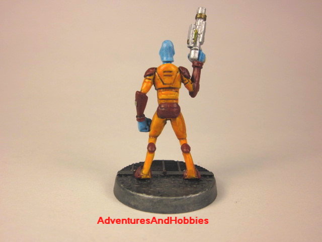 Alien warrior with handgun painted 25 mm figure for science fiction role-playing games and table top war games rear view