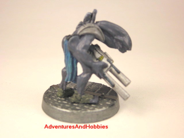 Alien warrior with pulse rifle painted 25 mm figure for science fiction role-playing games and table top war games rear view