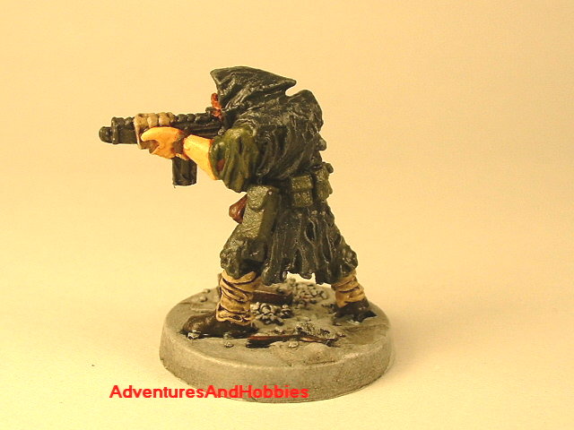 Post apocalypse soldier with assault rifle 25 mm painted figure for role-playing games and table top war games rear view