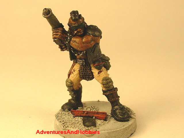 Post apocalypse soldier with assault rifle and armor 25 mm painted figure for role-playing games and table top war games front view