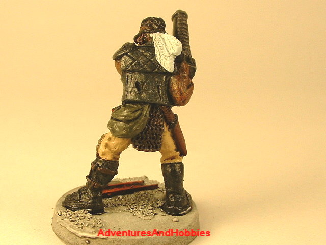 Post apocalypse soldier with assault rifle and armor 25 mm painted figure for role-playing games and table top war games rear view