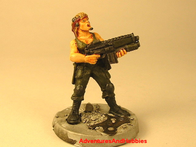 Post apocalypse female soldier with assault rifle and grenade launcher 25 mm painted figure for role-playing games and table top war games front view