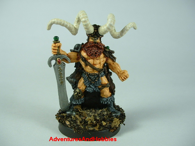 Barbarian chief fighter with broadsword and horned helmet painted figure for fantasy role-playing games and table top war games - front view