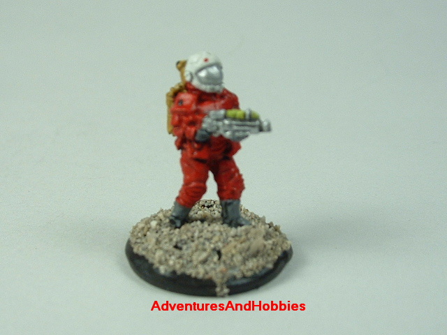 Space marine in vac suit with energy rifle 15 mm painted figure for science fiction role-playing games and table top war games front view