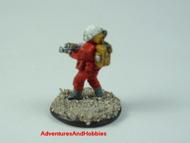 Space marine in vac suit with energy rifle 15 mm painted figure for science fiction role-playing games and table top war games rear view