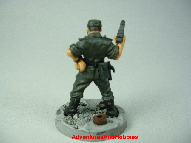 Post apocalypse officer leader soldier zombie hunter painted figure for role-playing games and table top war games - rear view