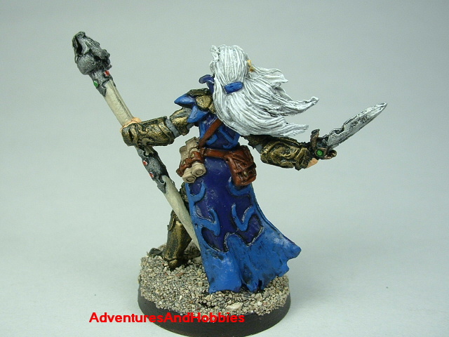 Dark elf sorcerer with staff and dagger painted figure for fantasy role-playing games and table top war games - rear view