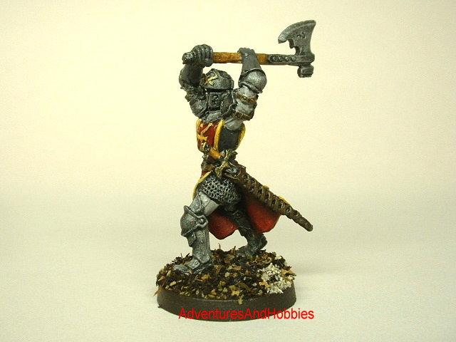 Knight in platemail attacking with two handed battle axe painted 25mm fantasy war game miniature