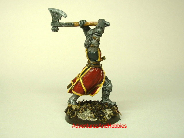 Knight in platemail attacking with two handed battle axe painted 25mm fantasy war game miniature