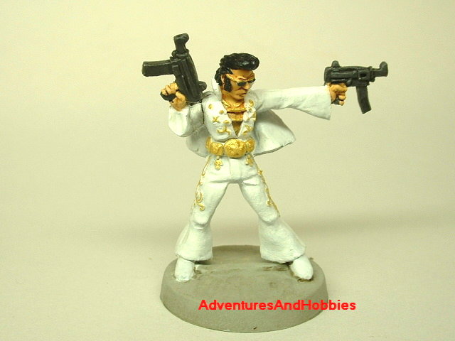 Elvis King of Rock and Roll Zombie Hunter 25 mm painted miniature fugure for war games and role-playing games front view.