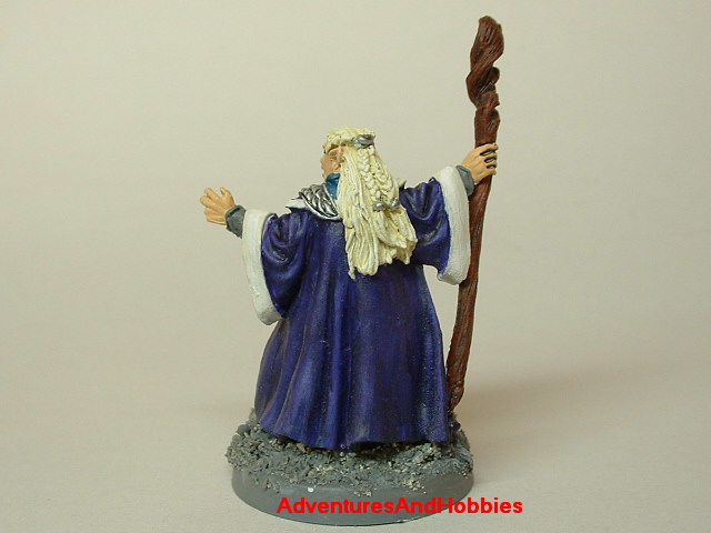 Elf wizard casting spell 25mm painted fantasy figure for use in role-playing games and table top war games front