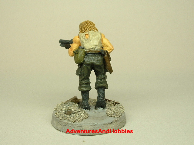 Post apocalypse survivor with combat shotgun painted 25 mm figure for role-playing games and table top war games rear view