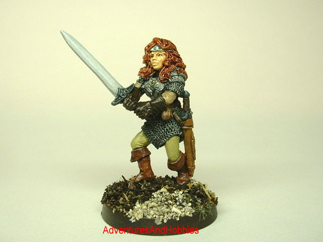 Human female warrior with two-handed sword 25 mm painted fantasy miniature