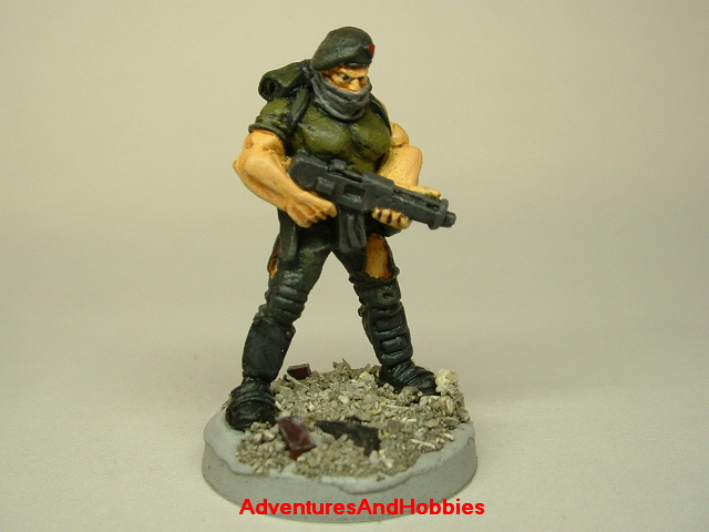 Post apocalypse zombie survivor soldier painted figure for role-playing games and table top war games front view.