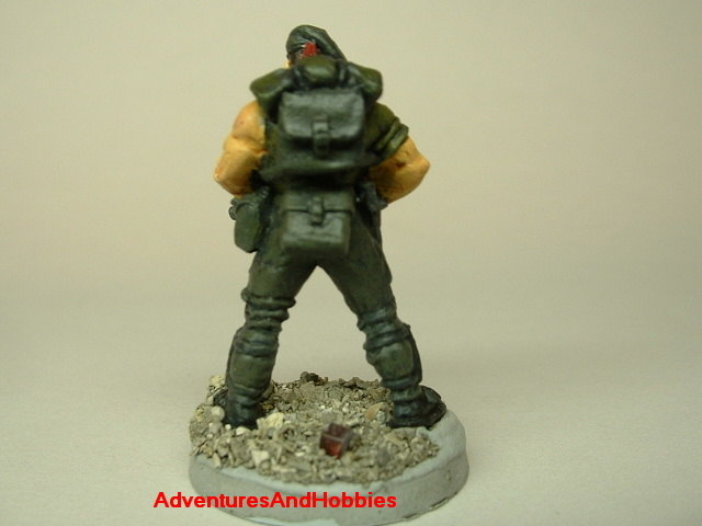 Post apocalypse zombie survivor soldier painted figure for role-playing games and table top war games rear view.