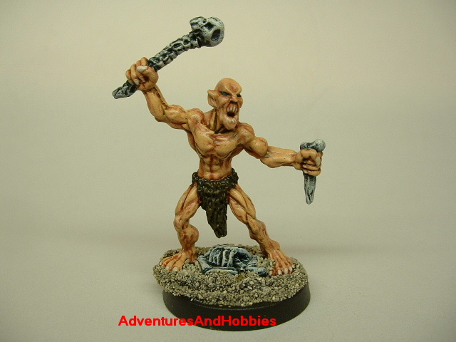 Ghoul attacking with bone weapons painted figure for horror and fantasy role-playing games and table top war games front view